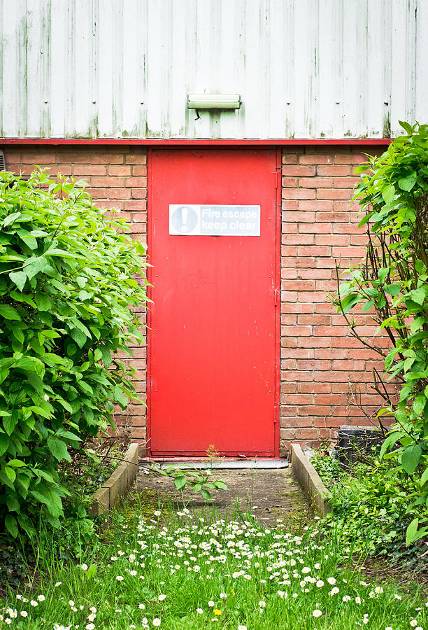 Brick Photograph - Red fire door by Tom Gowanlock