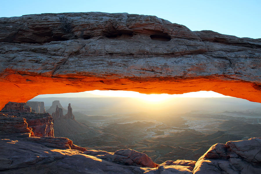 Red glow at Mesa Arch in Canyonlands NP Photograph by Pierre Leclerc Photography