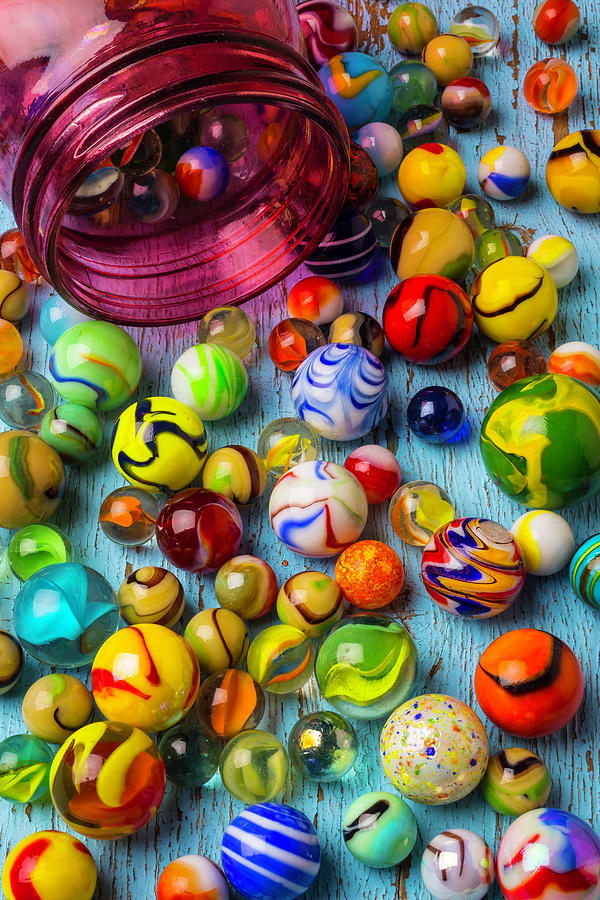 Red Jar With Colorful Marbles Photograph by Garry Gay