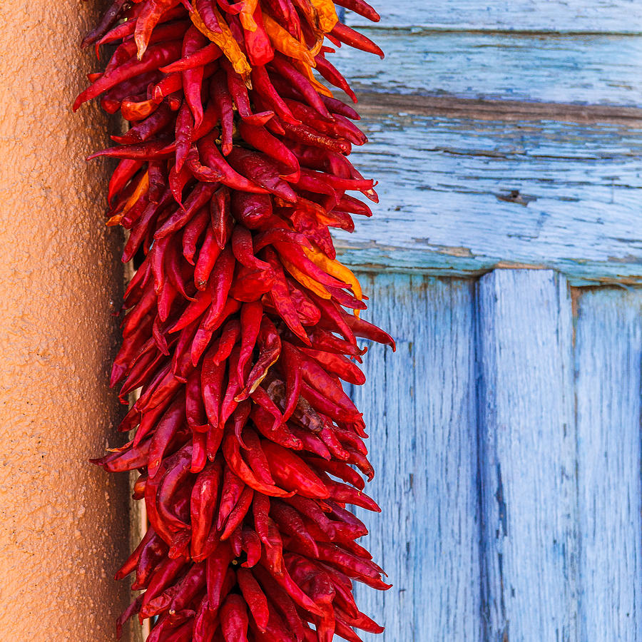 Red Peppers And Blue Door Photograph by Steven Bateson