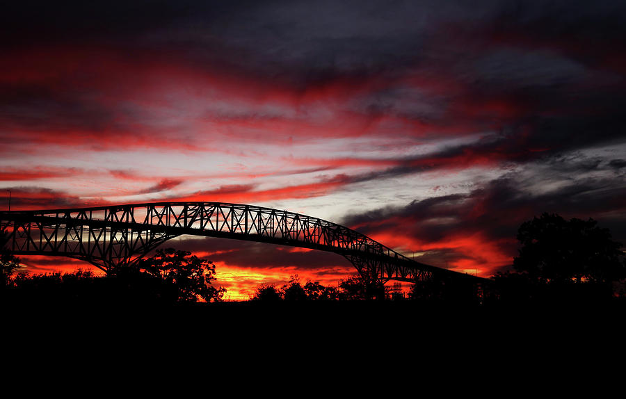 Red Skies at Pleasure Island Bridge Photograph by Judy Vincent