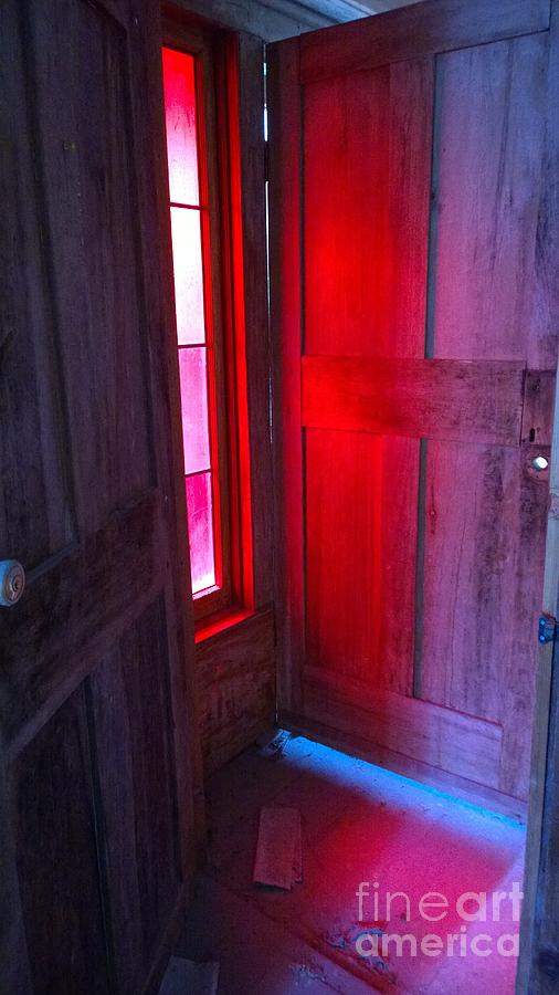 Red Stained Glass Reflected On Door Photograph by Susan Carella