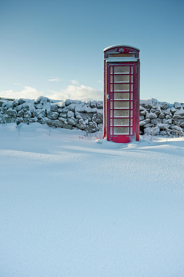 Red Telephone Box in the Snow Photograph by Helen Jackson