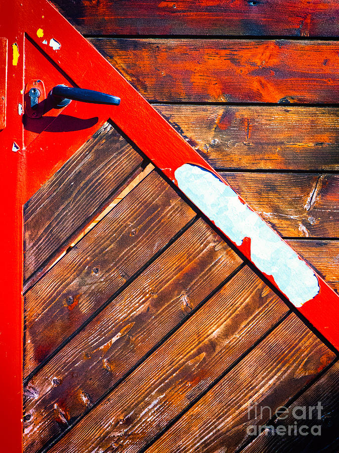 Red triangle on door Photograph by Silvia Ganora