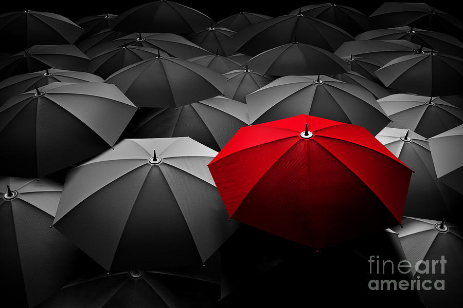 Red umbrella stand out from the crowd of many black and white umbrellas Photograph by Michal Bednarek