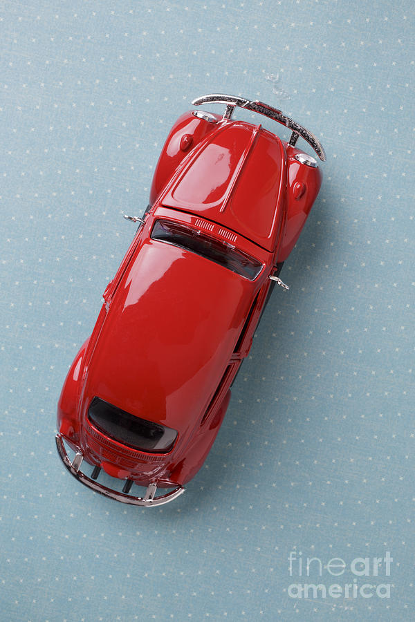 Red Volkswagen Beetle from above Photograph by Edward Fielding