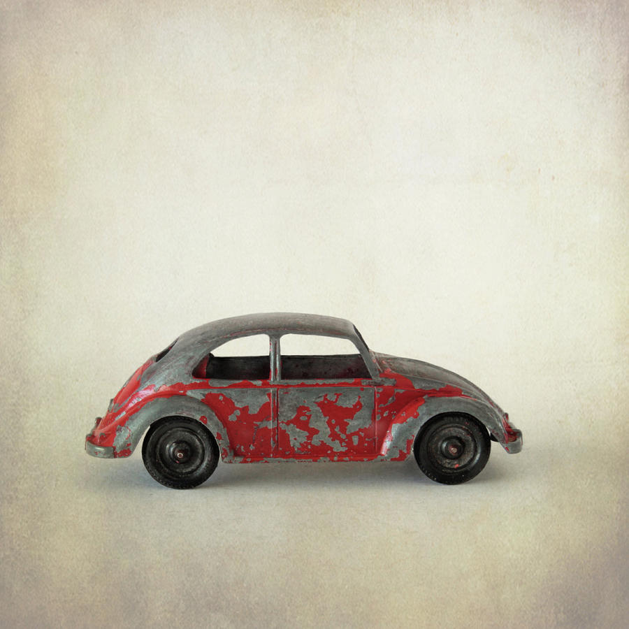 Red Volkswagon Beetle Toy Photograph by David and Carol Kelly