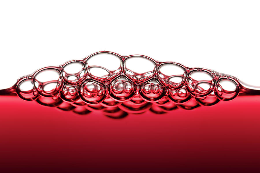 Wine Photograph - Red Wine Bubbles by Johan Swanepoel