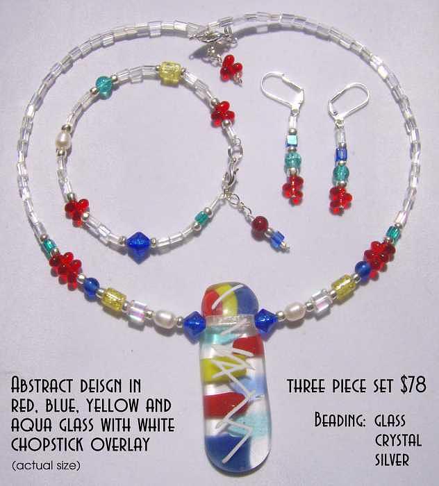 Jewelry Mixed Media - Red Yellow Blue Aqua Glass with White Chopstick Overlay by Michelle Lake