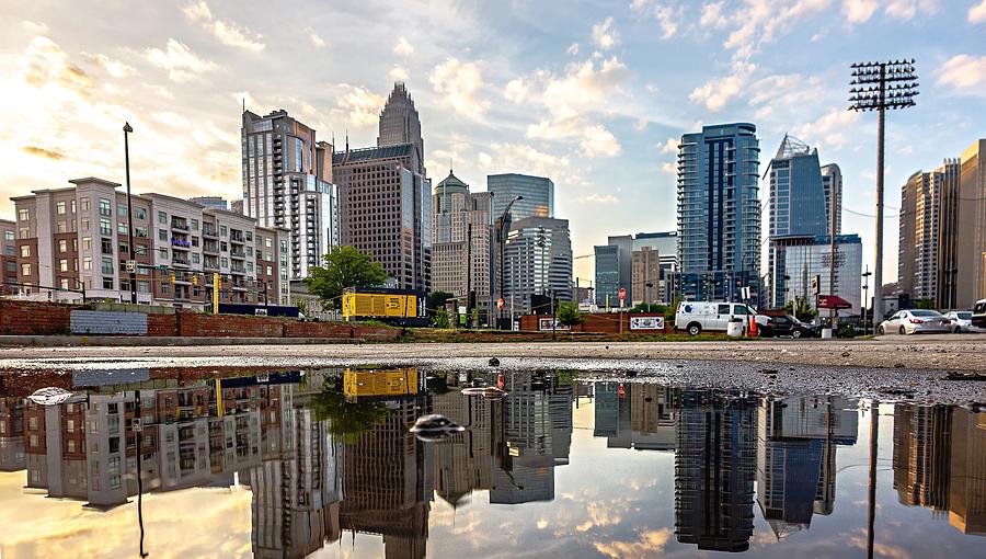 Reflecting Charlotte North Carolina Skyline In The Puddle After  Photograph by Alex Grichenko