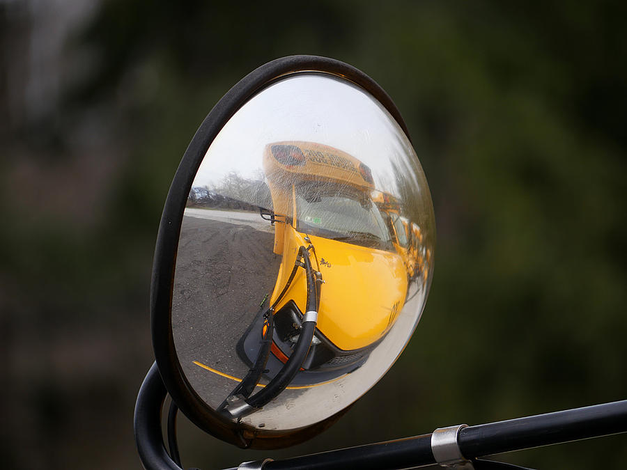 Reflecting on a School Bus Photograph by Richard Reeve