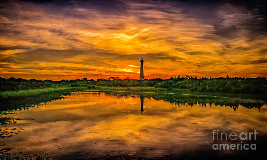 Reflecting Sunset at the Lighthouse Photograph by Nick Zelinsky Jr