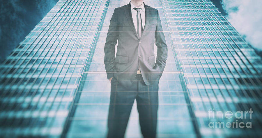 Reflection of a businessman in modern skyscraper. Business leader, career growth Photograph by Michal Bednarek