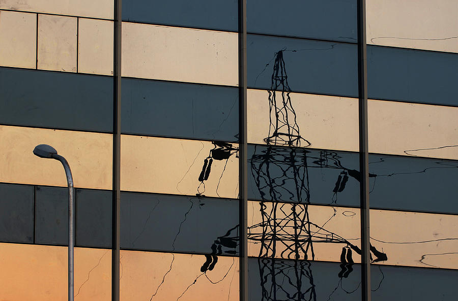 Reflection of Electricity Tower Photograph by Prakash Ghai