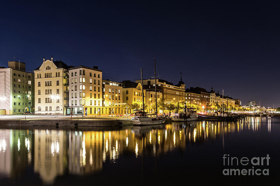 Reflection of Helsinki waterfront at night in Finland Photograph by Didier Marti
