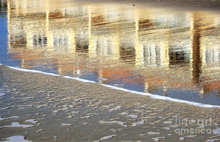 Reflection Of The Seashore  Photograph by Jan Gelders