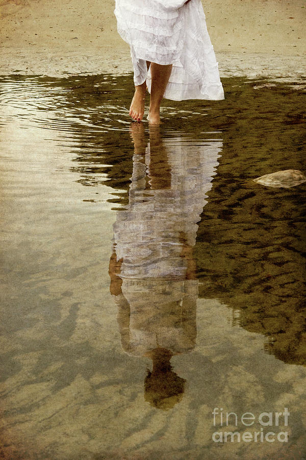 Reflection of woman in water Photograph by Clayton Bastiani