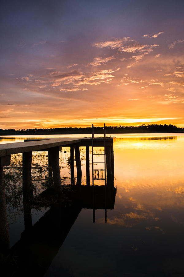 Sunset Photograph - Reflections by the Dock by Parker Cunningham