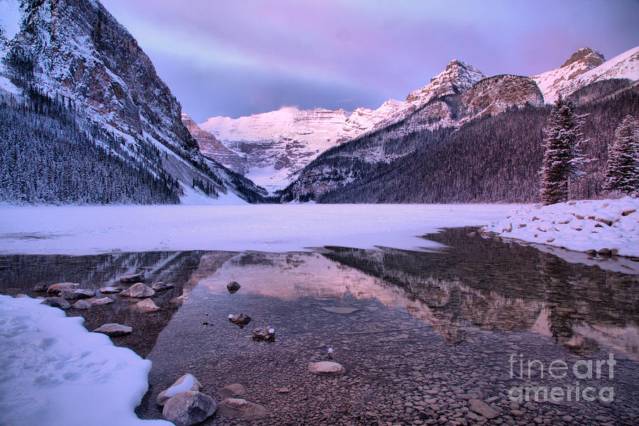 Reflections In Frozen Lake Louise Photograph by Adam Jewell