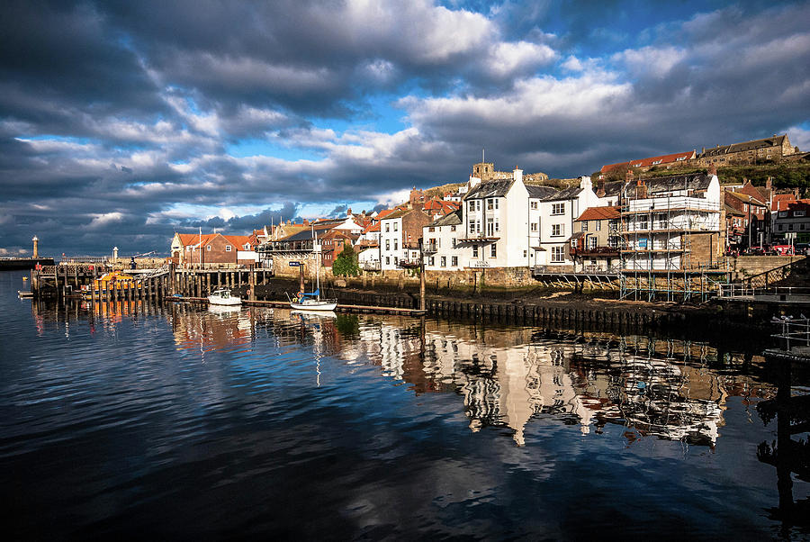 Whitby Photograph - Reflections in the harbour at Whitby by Peter Jenkins