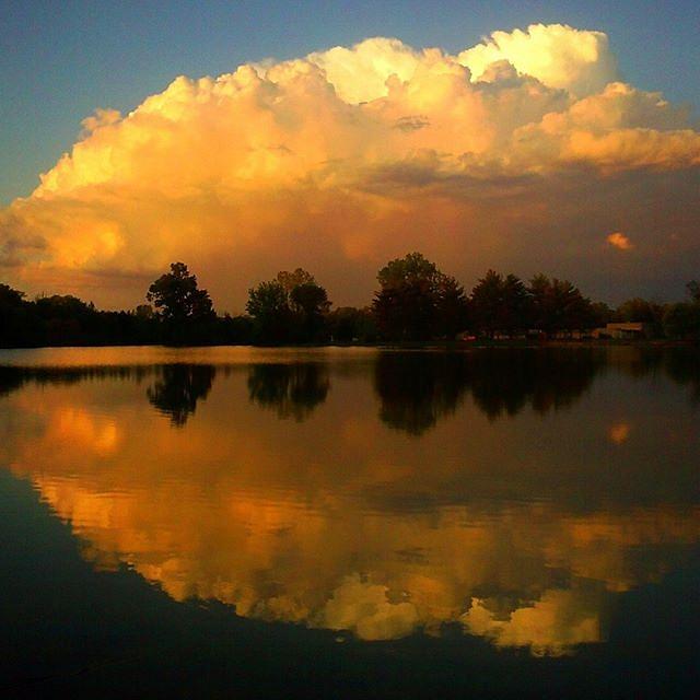 Nature Photograph - Reflections Of A Passing Storm That Had by Douglas Carey