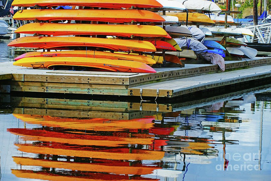 Reflections of Orange Kayaks Photograph by Randy Harris