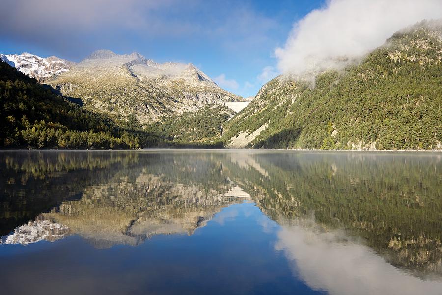 Reflections of the 1st snow above Lac dOredon Photograph by Stephen Taylor