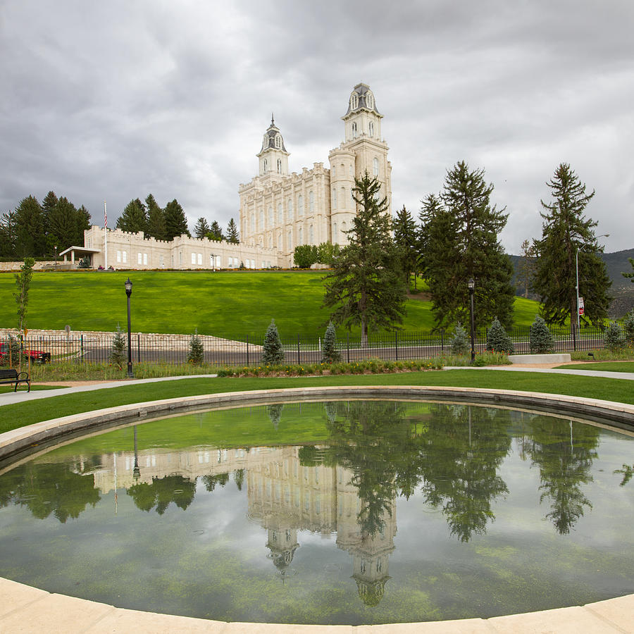 Reflections of the Manti Temple at Pioneer Heritage Gardens Photograph by Denise Bird