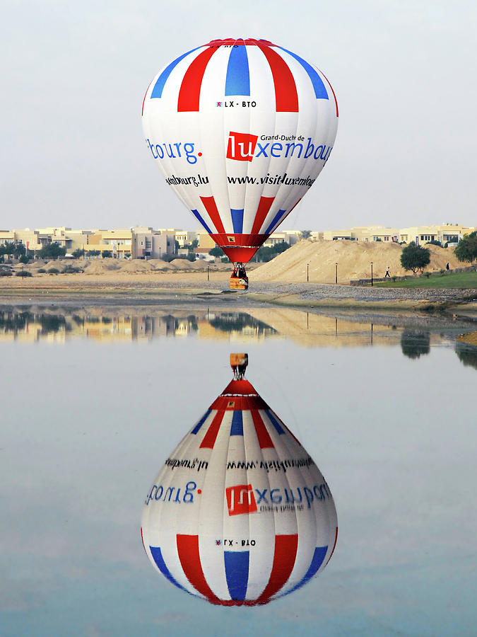 Flying Photograph - Reflective Balloon by Graham Taylor