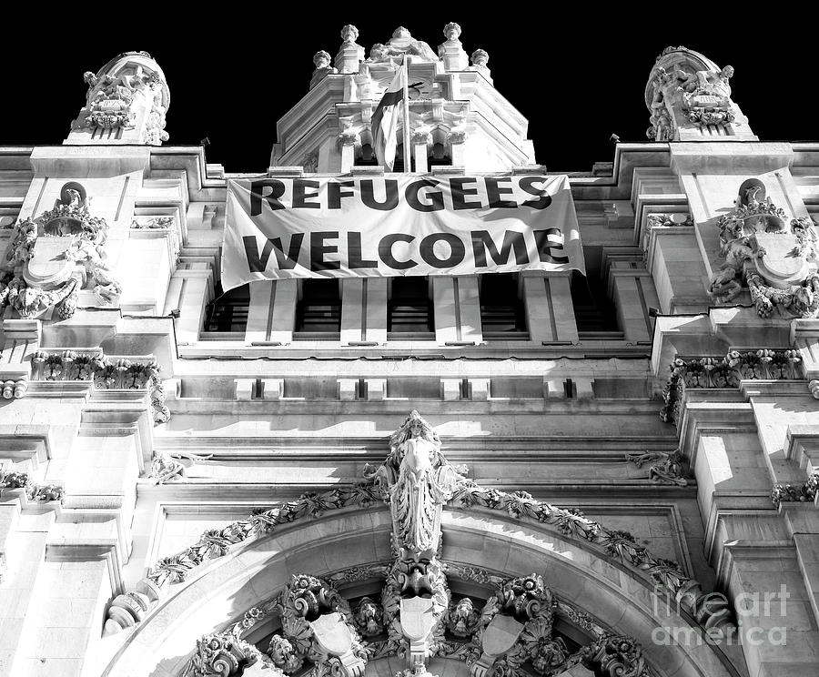 Refugees Welcome in Madrid Photograph by John Rizzuto