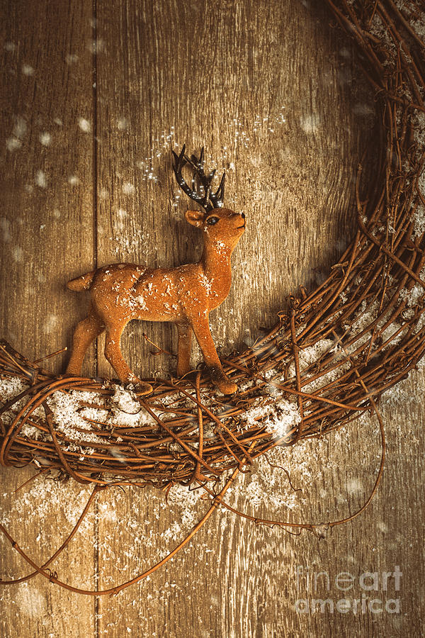 Reindeer Garland With Falling Snow Photograph by Amanda Elwell