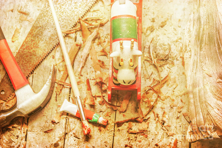Reindeer with tools and wood shavings Photograph by Jorgo Photography