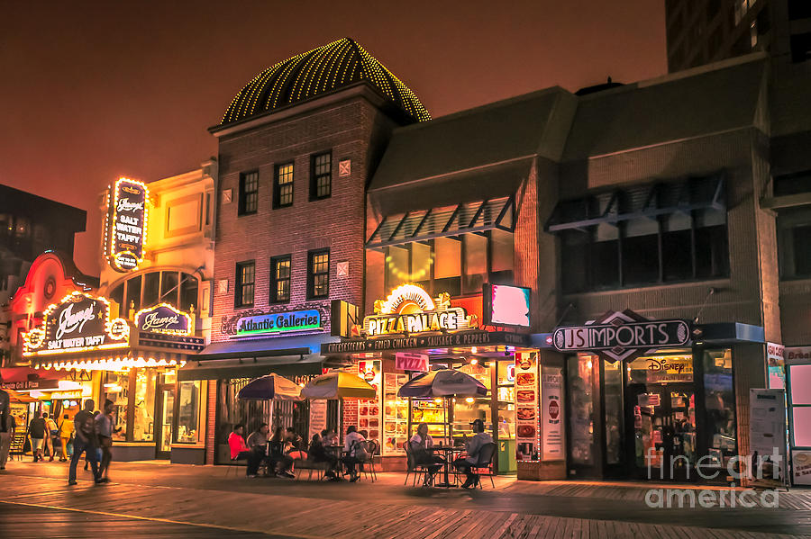 Relaxing night on boardwalk Photograph by Claudia M Photography
