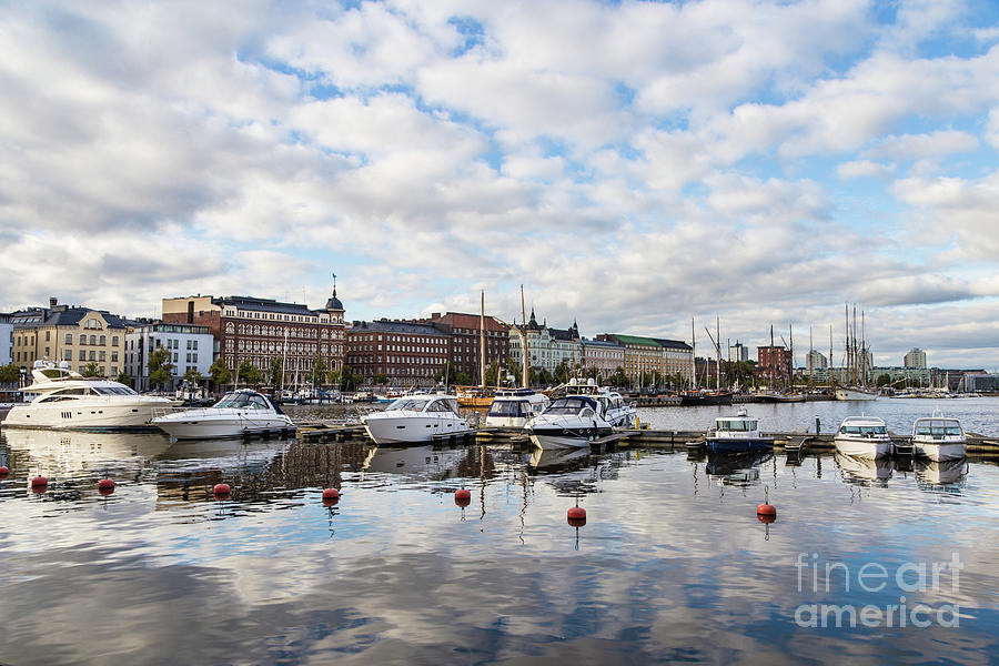Relfection in Helsinki harbor Photograph by Didier Marti