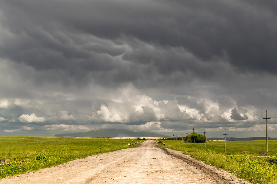 Remote Dirt Track Leads to Stormy Horizon Photograph by John Williams