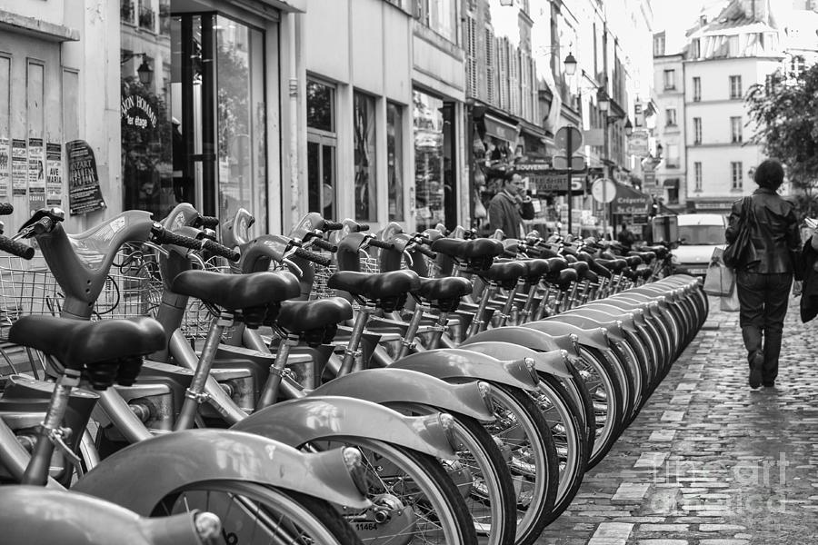 Rent Movie Photograph - Rental bikes in Paris by Patricia Hofmeester