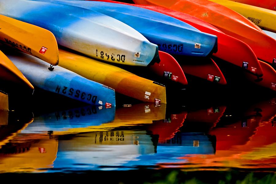 Rental canoes Photograph by Bill Jonscher
