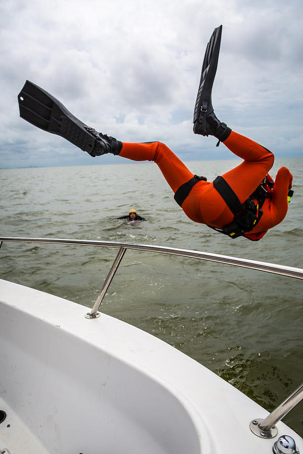 Rescue Swimmer Overboard Photograph by Gregory Daley  MPSA