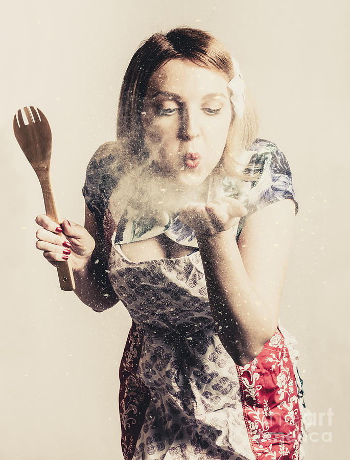 Retro cooking woman giving recipe kiss Photograph by Jorgo Photography
