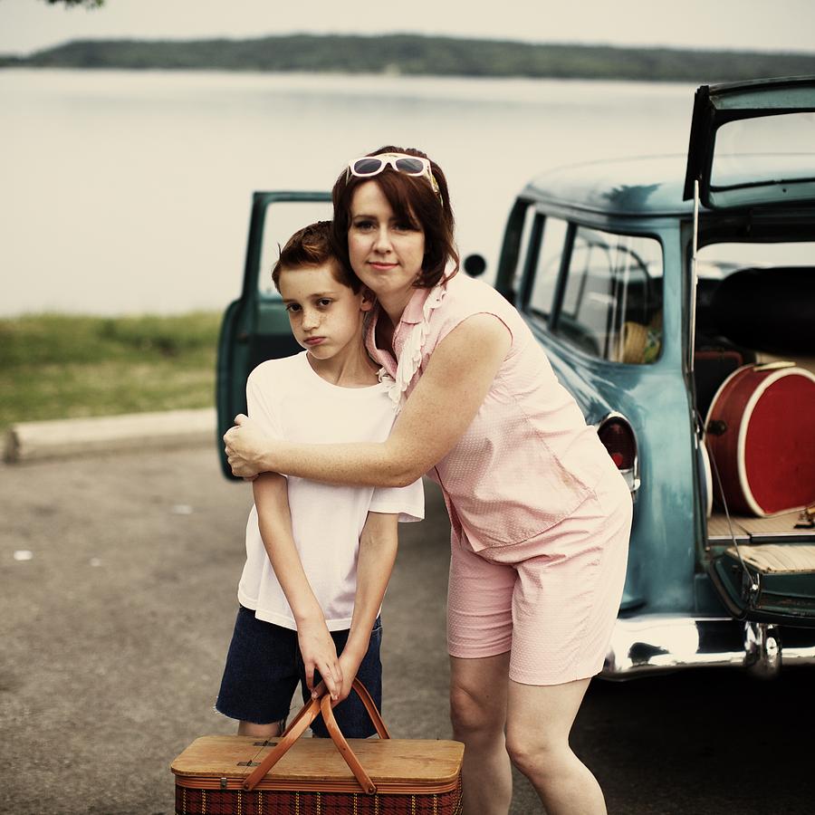 Nature Photograph - Retro Mom Hugging Boy Holding Picnic by Gillham Studios