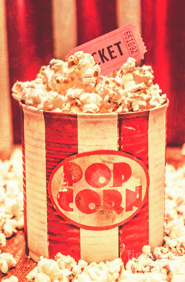 Retro tub of butter popcorn and ticket stub Photograph by Jorgo Photography