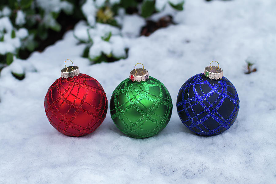 RGB Christmas balls on snowy ground Photograph by William Lee