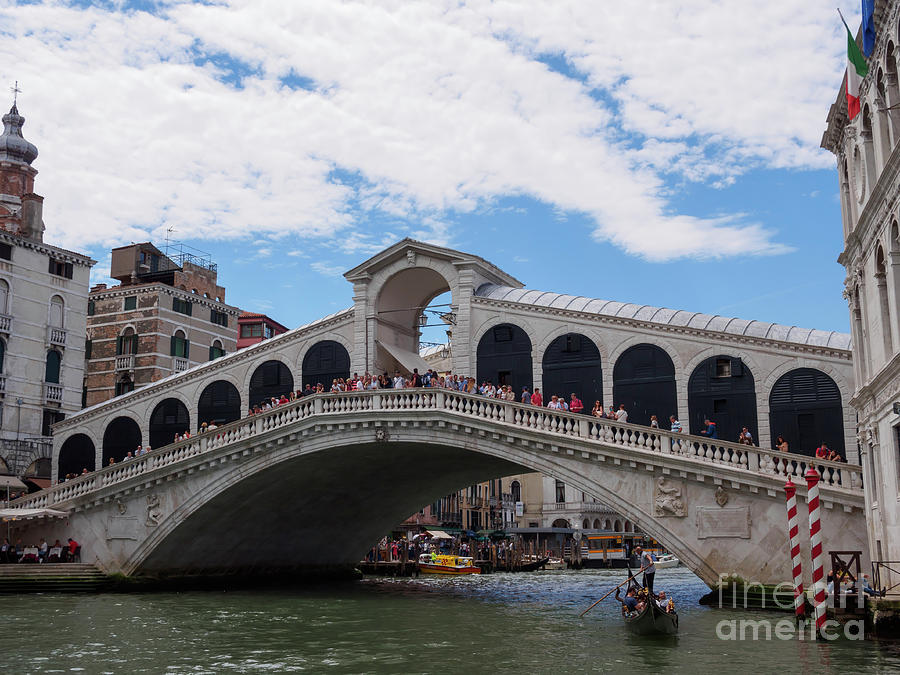 Rialto Bridge in the Grand Canal in Venice Photograph by Louise Heusinkveld