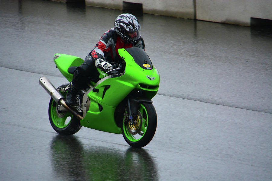 Rider in the Rain Photograph by Mike Martin
