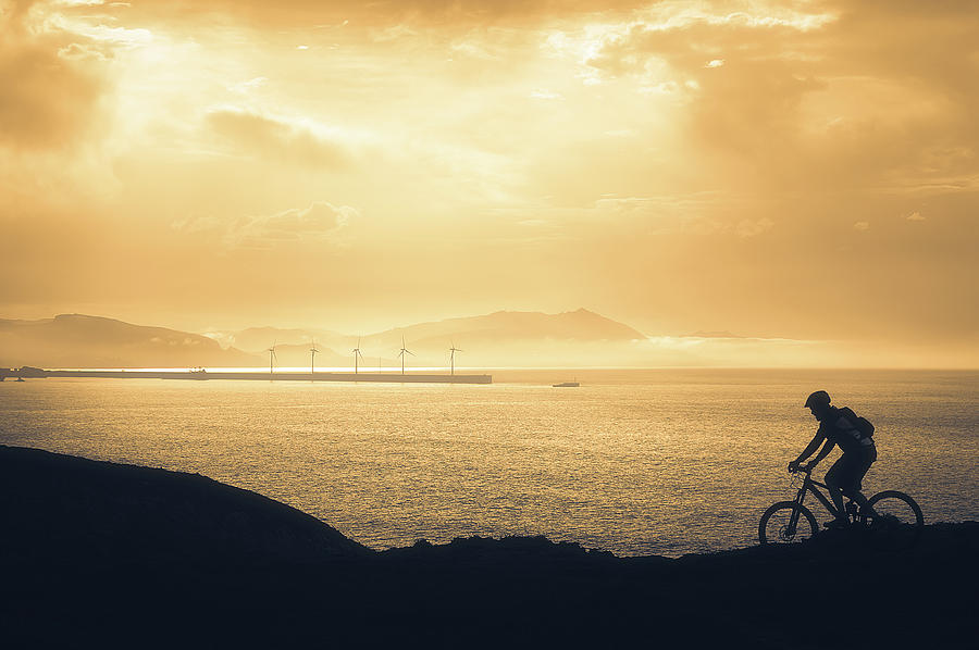 Riding on the edge Photograph by Mikel Martinez de Osaba