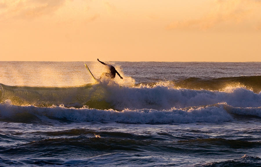 Surf Photograph - Riding the Crest by Michael Dawson