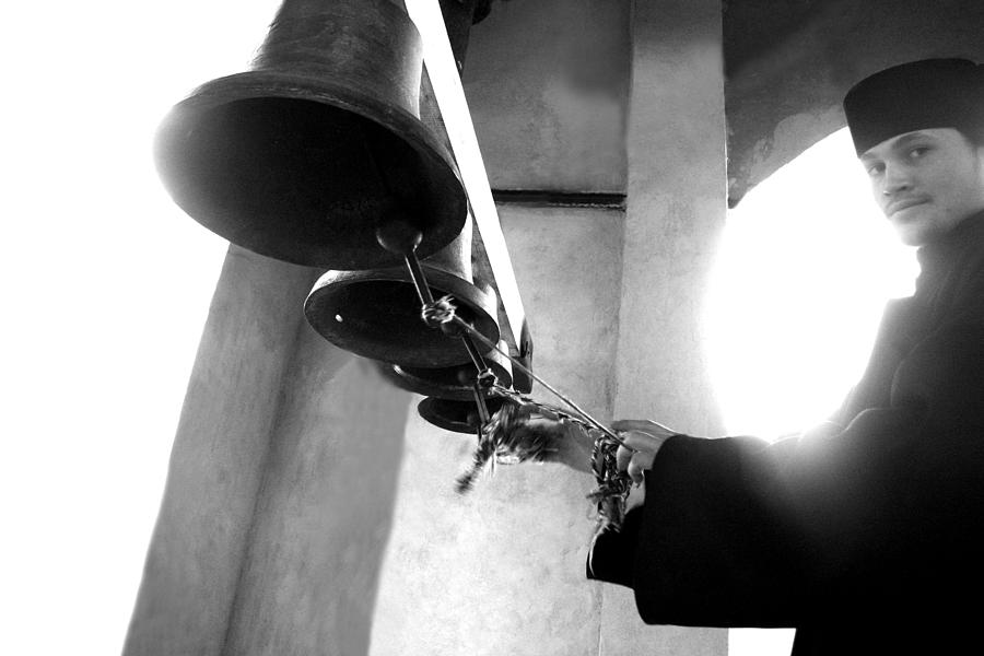 Ringing the bells at the monastery Photograph by Emanuel Tanjala