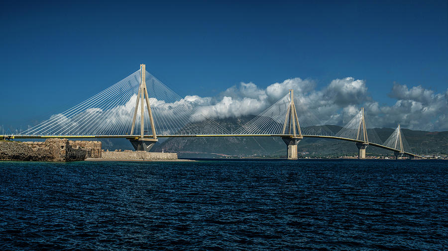 Greek Photograph - Rio-Andirio Bridge on a cloudy day by Jaroslaw Blaminsky