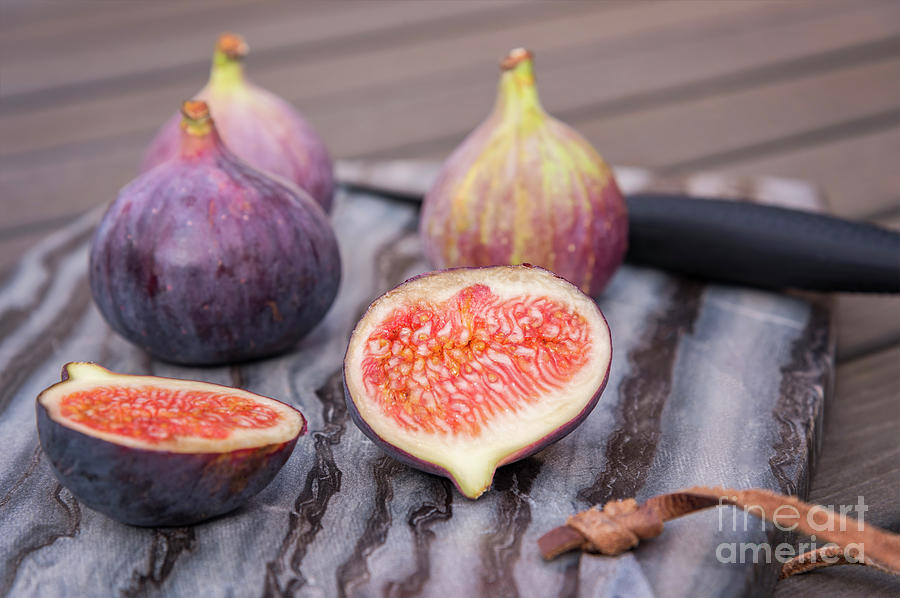 Ripe figs on cutting board Photograph by Sophie McAulay