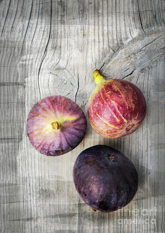 Ripe figs on vintage wood Photograph by Sophie McAulay